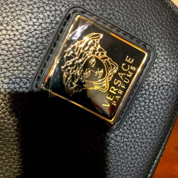 Brand new authentic cosmetic Versace case with 2 zipper compartments with handle